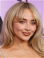 Sabrina Carpenter's Captivating Visage: a Look at Her Alluring Features